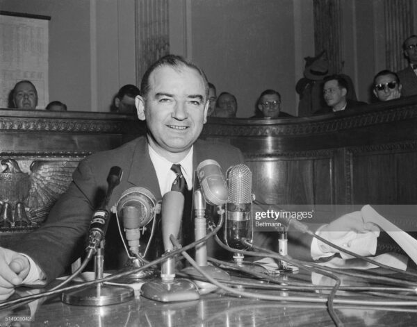 (Original Caption) Senator Joseph R. McCarthy chairman of the Senate Investigations Subcommittee, is shown as he took center stage again to comment on the latest developments in his dispute with the White House and Army Secretary Robert T. Stevens.